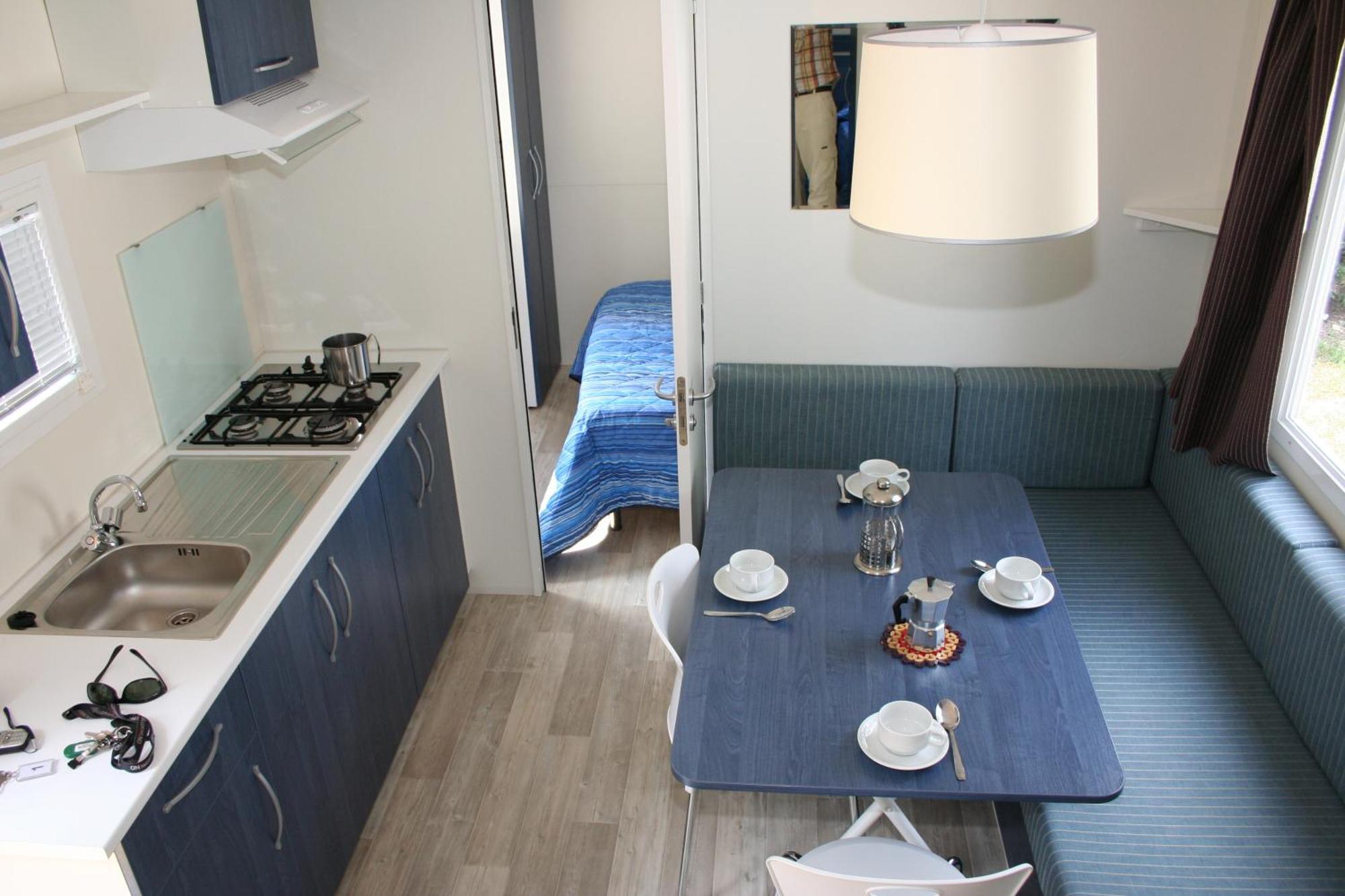 Happy Camp Mobile Homes In Camping Villaggio Internazionale San Menaio Exterior photo
